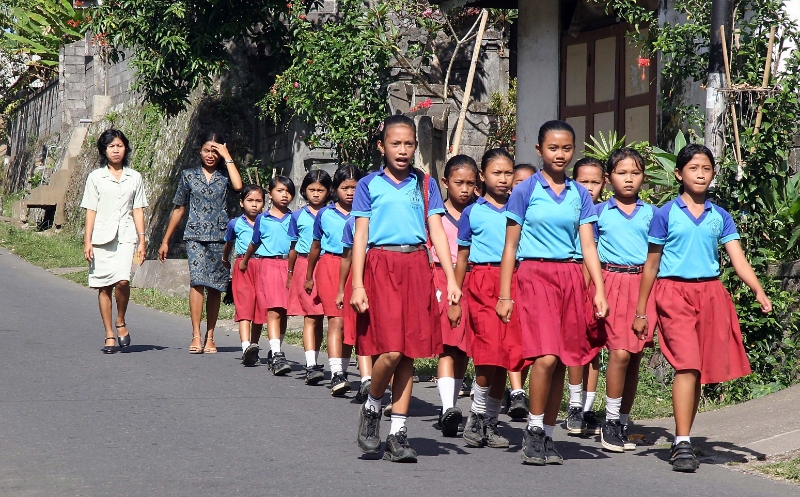 School children preparing for National Day, Bali Tirtagangga Indonesia.jpg - Indonesia Bali Tirtagangga. School children preparing for National Day